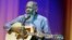 FILE - In this May 1, 2008 file photo, Richie Havens plays at the opening night ceremony during the 61st International film festival in Cannes, southern France.