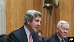 Senate Foreign Relations Committee Chairman Sen. John Kerry, D-Mass., left, accompanied by the committee's ranking Republican Sen. Richard Lugar, R-Ind., makes a statement on the crisis in Egypt, Feb. 1, 2011