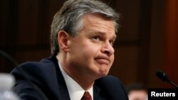 Director of the Federal Bureau of Investigation Christopher Wray testifies before a Senate Judiciary Committee hearing on "Examining the Inspector General's First Report on Justice Department and FBI Actions in Advance of the 2016 Presidential Election," on Capitol Hill in Washington, June 18, 2018.