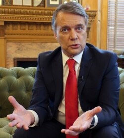 FILE - In this file photo taken Dec. 20, 2018, departing Kansas Gov. Jeff Colyer responds to questions from The Associated Press during an interview in his office in the Statehouse in Topeka, Kansas.