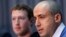 Russian entrepreneur and venture capitalist Yuri Milner (R) speaks while Facebook CEO Mark Zuckerberg looks on at the Life Sciences Breakthrough Prize announcement in San Francisco, California, Feb. 20, 2013. 