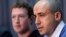 FILE - Russian entrepreneur and venture capitalist Yuri Milner (R) speaks while Facebook CEO Mark Zuckerberg looks on at the Life Sciences Breakthrough Prize announcement in San Francisco, California, Feb. 20, 2013. 