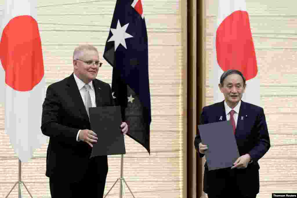 스가 요시히데 일본 총리와 스콧 모리슨 호주 총리가 도쿄에서 회담했다. 미국의 동맹국인 두 나라 총리는 인도태평양에서 중국의 위협에 대응한 안보 협력 강화를 위해 일본 자위대와 호주군의 공동훈련에 관한 협정에 합의 했다.