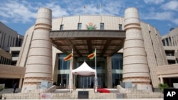 FILE - The entrance to the new Zimbabwean Parliament building in Mt. Hampden, west of the capital Harare, Nov. 23, 2022. 