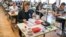 FILE - In this April 18, 2018 file photo students take a look at an exam test at the Graf-Zeppelin-Gymnasium in Friedrichshafen, Germany. 