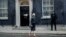 FILE - British Prime Minister Theresa May is seen walking outside 10 Downing Street in London, Nov. 9, 2016. 