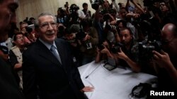 FILE - Former Guatemalan dictator Efrain Rios Montt arrives at the Supreme Court of Justice for his sentencing in Guatemala City, May 10, 2013. 