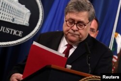 FILE - U.S. Attorney General William Barr departs after speaking at a news conference to discuss special counsel Robert Mueller's report on Russian interference in the 2016 U.S. presidential race, in Washington, April 18, 2019.