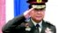 FILE - Commander-in-Chief of the Royal Thai Army Gen. Prayuth Chan-ocha salutes.