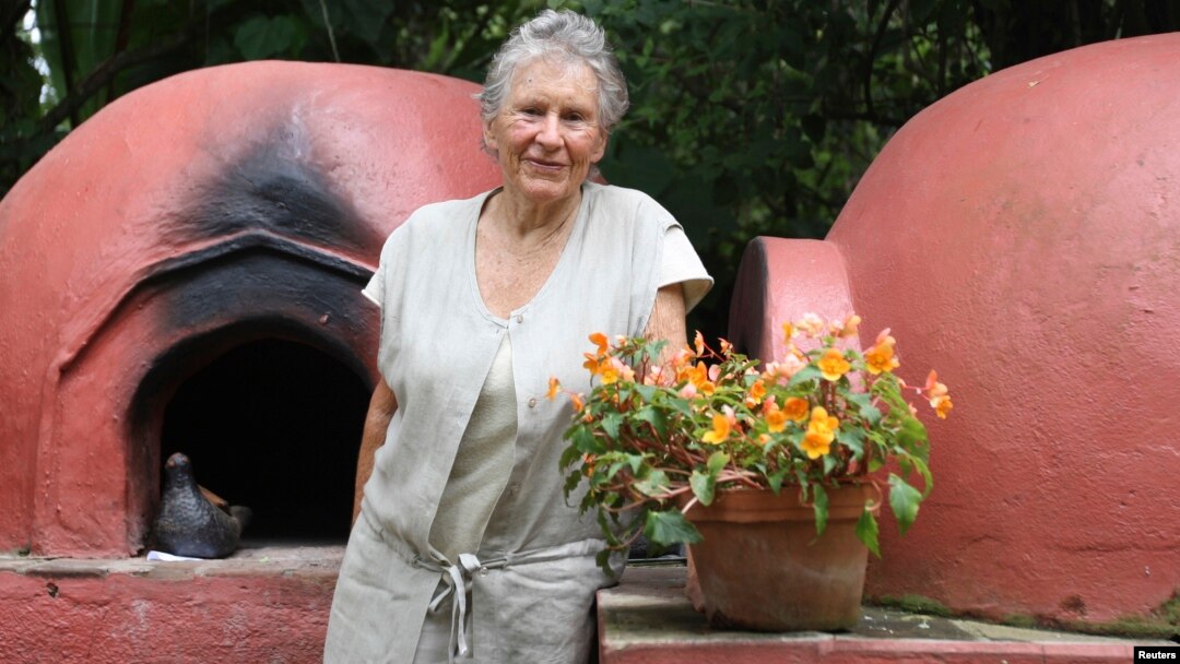FILE - British-born Diana Kennedy smiles as she poses for a picture in front of bread ovens at her house in the city of Zitacuaro in the western state of Michoacan, Sept. 12, 2008.