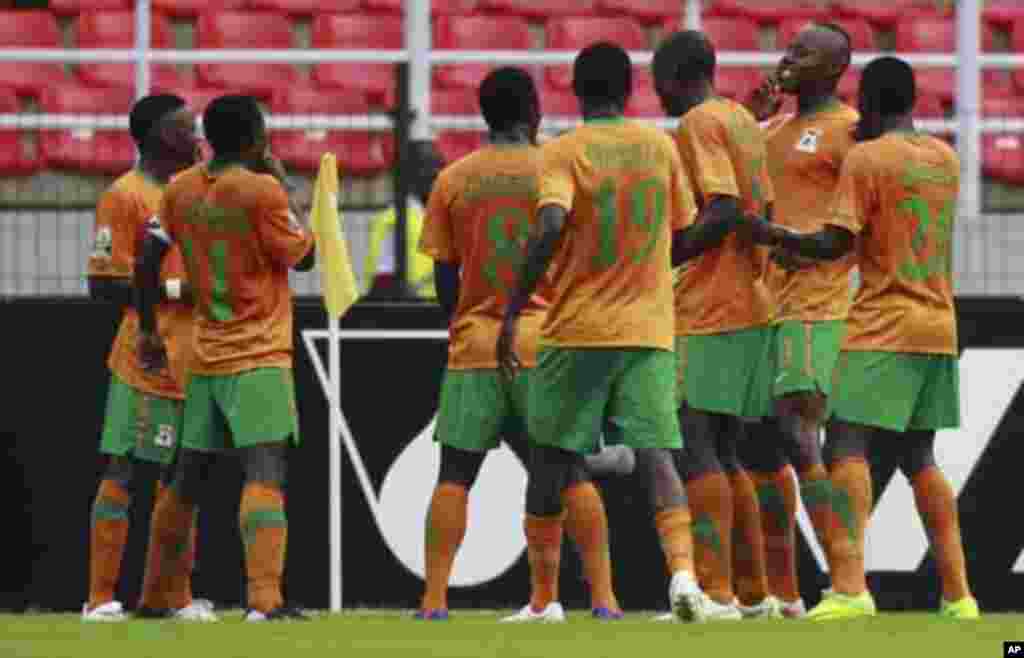 Zambia's Stophira Sunzu (2nd R) celebrates with his teammates after scoring a goal against Sudan during their African Nations Cup quarter-final soccer match at Estadio de Bata "Bata Stadium", in Bata February 4, 2012.