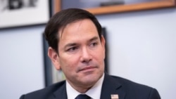 Sen. Marco Rubio, R-Fla., President-elect Trump's nominee to be secretary of State, listens as he meets with Sen. Lindsey Graham, R-S.C., the ranking member on the Senate Judiciary Committee, at the Capitol in Washington, Tuesday, Dec. 3, 2024. (AP Photo/J. Scott Applewhite)