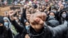 Demonstrators kneel and raise their fists at the Roemerberg square in Frankfurt, Germany, to protest the May 25 death of George Floyd while in police custody in Minneapolis, Minnesota, that has led to protests in many countries and across the U.S. 