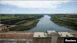 A view of the Itaipu Hydroelectric dam from the Paraguayan side, one the world's largest operational electricity generator which is facing an energy crunch as low river levels hit electricity production, in Hernandarias, Paraguay October 11, 2021. 