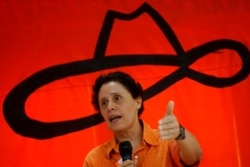 FILE - Former Sandinista revolutionary commander Dora Maria Tellez, president of the Sandinista Renewal Movement, speaks during the party meeting in Managua, Nicaragua, Aug. 21, 2005.