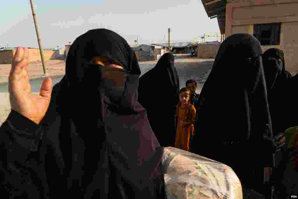 Iraqi women from Tikrit say they want to go back to their country at any cost, but their government has refused them in al-Hol Camp, on Oct. 12, 2024. (Yan Boechat/VOA)