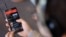 FILE - The YouTube Music app is displayed on a mobile phone, Nov. 13, 2015.