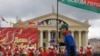 FILE - Schoolchildren perform at a ceremony marking Belarus’ holiday honoring the state flag and emblem in Minsk, Belarus, on May 13, 2012. 