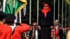 New Tanzanian President Samia Suluhu Hassan, inspects a military parade following her swearing in the country's first female President after the sudden death of President John Magufuli at statehouse in Dar es Salaam, Tanzania on March 19, 2021.