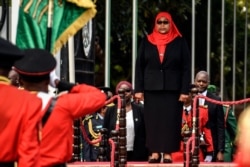 New Tanzanian President Samia Suluhu Hassan inspects a military parade following her swearing in the country's first female President after the sudden death of President John Magufuli at statehouse in Dar es Salaam, Tanzania on March 19, 2021.