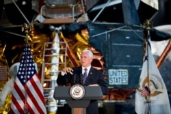 Vice President Mike Pence speaks before the unveiling of Neil Armstrong's Apollo 11 spacesuit at the Smithsonian's National Air and Space Museum on the National Mall in Washington, July 16, 2019.