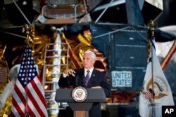 Vice President Mike Pence speaks before the unveiling of Neil Armstrong's Apollo 11 spacesuit at the Smithsonian's National Air and Space Museum on the National Mall in Washington, July 16, 2019.