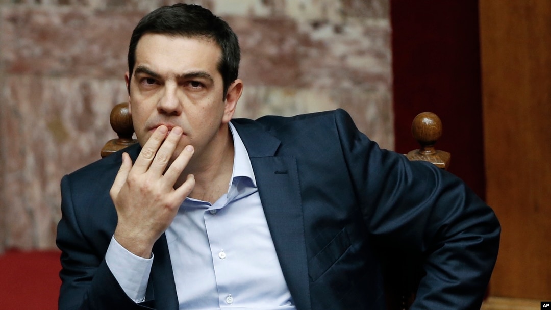 Greece's Prime Minister Alexis Tsipras gestures during a parliamentary session in Athens, March 30, 2015, after Tsipras called the special session of parliament to brief lawmakers on the course of recent troubled negotiations with bailout lenders to overhaul cost-cutting reforms.