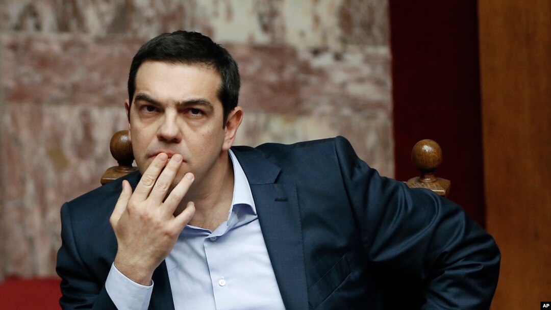 FILE - Greece's Prime Minister Alexis Tsipras gestures during a parliamentary session in Athens, March 30, 2015. 