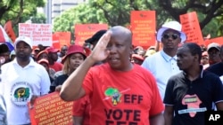 FILE - Leader of the Economic Freedom Fighters (EFF) Julius Malema, leads a protest march in Pretoria, South Africa, March 20, 2023.