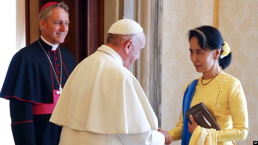 Pope Francis holds a palm branch as he leads Palm Sunday Mass in St. Peter&#39;s Basilica without public participation due to the spread of coronavirus disease (COVID-19), at the Vatican.