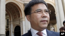FILE - The then-chairman of the Bank of China, Liu Liange, arrives at a forum in Milan, Italy, on July 10, 2019. Liu has been expelled from the Chinese Communist Party after being accused of illegal activities and taking bribes.
