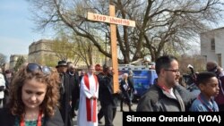 Cardinal Blase Cupich of the Roman Catholic Archdiocese of Chicago leads a prayer walk for peace through the Englewood neighborhood, which is regularly the scene of gun violence, Chicago's South Side, April 14, 2017. 