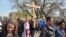 Cardinal Blase Cupich of the Roman Catholic Archdiocese of Chicago leads a prayer walk for peace through the Englewood neighborhood, which is regularly the scene of gun violence, Chicago's South Side, April 14, 2017. 