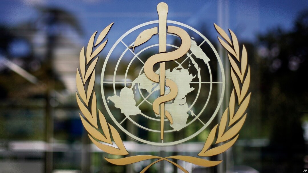 FILE - The logo of the World Health Organization is seen at the WHO headquarters in Geneva, Switzerland.