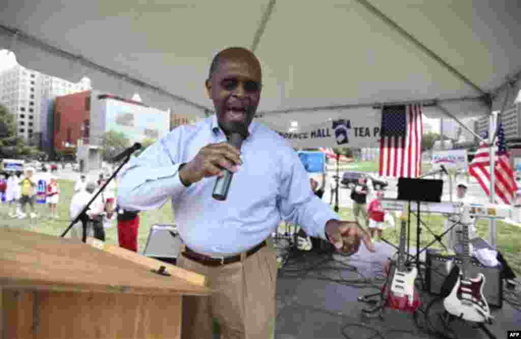 Republican presidential candidate Herman Cain speaks during the "'Energy Independence Day Tea Party" rally on Independence Mall in Philadelphia, on Monday July 4, 2011. (AP Photo/ Joseph Kaczmarek)