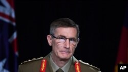 Chief of the Australian Defense Force Gen. Angus Campbell delivers the findings from the Inspector-General of the Australian Defense Force Afghanistan Inquiry, in Canberra, Nov. 19, 2020.