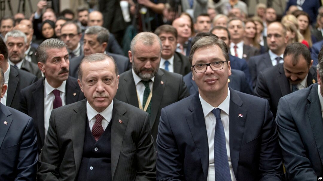 Turkish President Recep Tayyip Erdogan, front left, and his Serbian counterpart Aleksandar Vucic, front right, attend a Serbian-Turkish business forum in Belgrade, Serbia, Oct. 10, 2017.