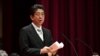 Japan's Prime Minister Shinzo Abe delivers a speech during the graduation ceremony of the National Defense Academy in Yokosuka, Kanagawa prefecture, Japan, March 18, 2018.