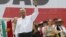 Election runner-up Andres Manuel Lopez Obrador waves to supporters