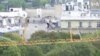 Barefoot Rope Walker Scales the Heights From the Eiffel Tower