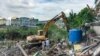 In this photo taken on May 27, 2019, residential homes belong to Boeng Kok people were bulldozed by Shukaku company, in Phnom Penh, Cambodia. 