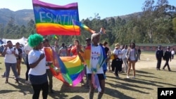 FILE - People take part in Eswatini's first gay pride demonstration in Mbabane, June 30, 2018. Human rights lawyer Sibusiso Nhlabatsi says the harsh legal environment for LGBTQ people in the kingdom causes significant problems for them. 