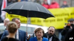 La chancelière allemande Angela Merkel, lors de précédentes discussions à Berlin, le 11 janvier 2018.