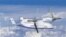 A screenshot shows an image of the Lanying R6000, a 6-ton tiltrotor unmanned aerial vehicle, from the United Aircraft website. The company website describes the R6000 drone as a "car in the sky" that can seat up to 12 people.