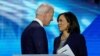 FILE - Democratic presidential candidate former Vice President Joe Biden, left, and then-candidate Sen. Kamala Harris, D-Calif. shake hands after a Democratic presidential primary debate.