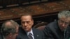 Berlusconi Agrees to Resign