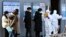People suspected of being infected with the new coronavirus wait to receive tests at a medical center in Daegu, South Korea, Feb. 20, 2020. 