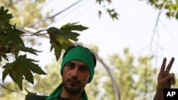 An Iranian opposition supporter from the Green Movement (file photo)