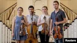 The Polyphony Quartet — from left, Revital Bendersky, Mahdi Saadi, Shir Semmel and Feras Machour — are pictured at All Souls Church in New York, May 27, 2015. 