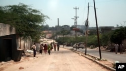 The city's once congested roads are empty of people and cars. As
many as 1.7 million residents have fled nearly daily fighting in
Mogadishu since early 2007.